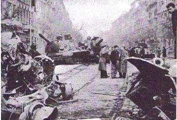 Destroyed tank and building on the streets of Budapest